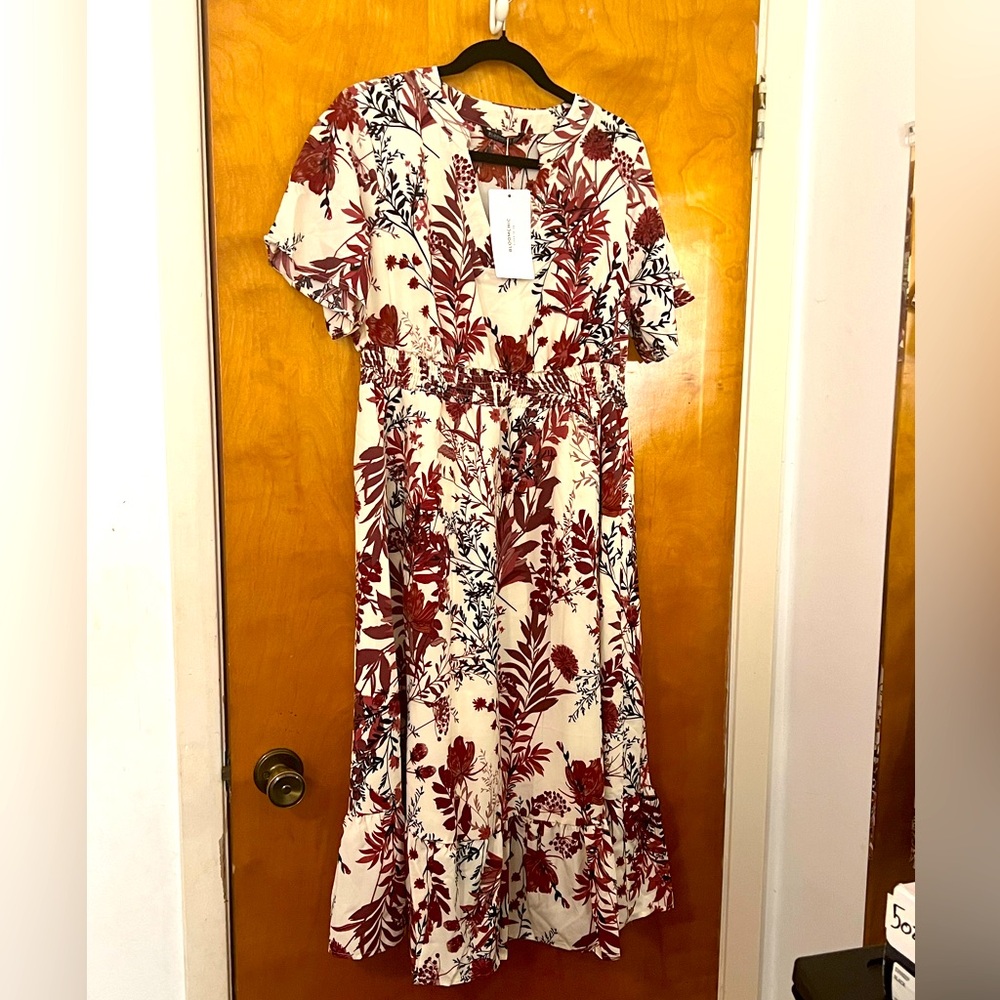 Rust ,cream, and black tropical floral dress.
